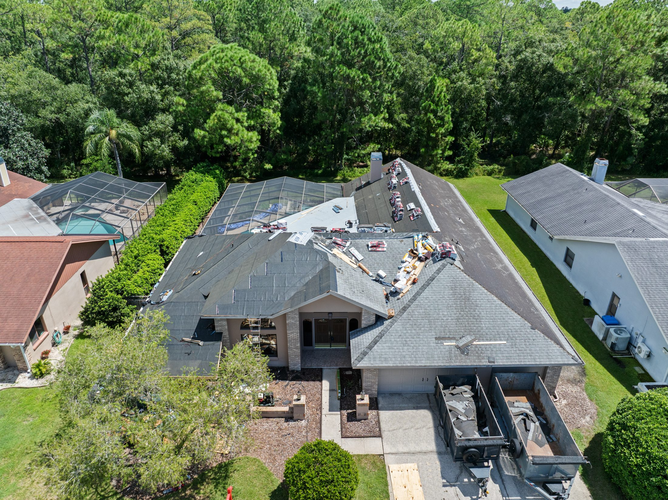 Shingle roof replacement with the crew on site
