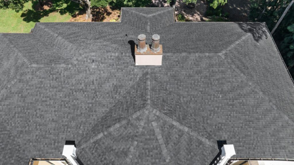Shingle roof replacement on a large home in Tampa, FL by Primmer Roofing
