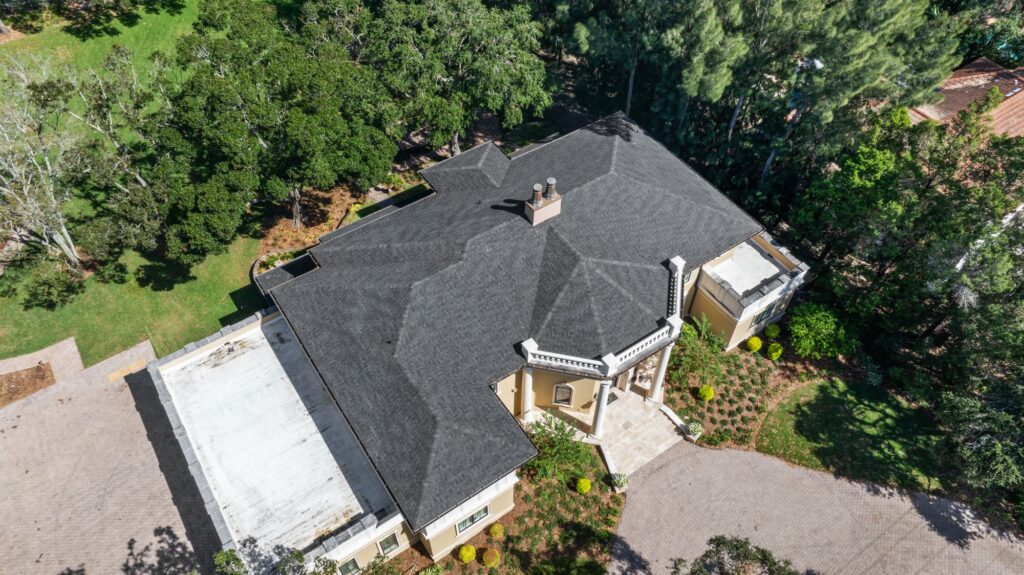 Shingle roof replacement on a large home in Tampa, FL by Primmer Roofing