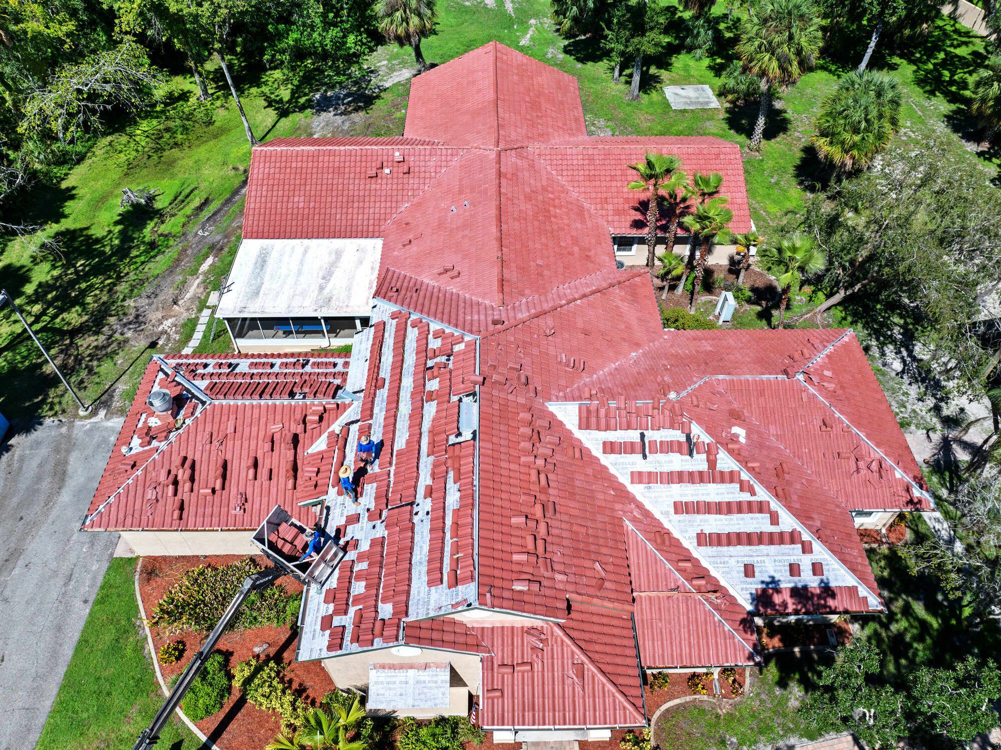 Tile roof replacement at a Boys & Girls Club in New Port Richey, FL by Primmer Roofing